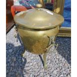 19TH CENTURY BRASS LIDDED BUCKET ON 3 LION CLAW SUPPORTS,