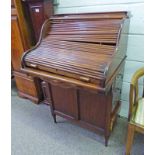 EARLY 20TH CENTURY MAHOGANY ROLL FRONT CABINET WITH DRAWERS TO EITHER SIDE