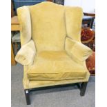 MAHOGANY FRAMED WINGBACK ARMCHAIR ON SQUARE SUPPORTS