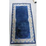 BLUE GROUND ORIENTAL STYLE RUG