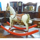 19TH CENTURY ROCKING HORSE WITH SKIN COVERING