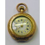 LADIES FOB WATCH WITH DECORATIVE DIAL. THE CASE MARKED 14K 22.