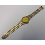 GUCCI WRIST WATCH WITH GILDED DIAL SWEEP SECOND HAND AND DATE ON GUCCI BRACELET