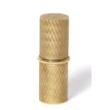 A 9ct gold cylindrical lipstick/ holder with engine turned engraving