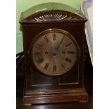 An early 20th century chiming mantel clock, the case with arched top