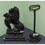 A Georgian door stop and a cast lion door stop (2)