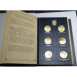 A set of silver gilt Churchill centenary medals by John Pinches, in folder