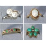 A 9 carat white gold cultured pearl and diamond ring, finger size N, a 9 carat gold opal ring,
