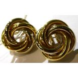 A pair of two colour knot clip earrings, stamped '750'Stamped '750', valued as gold. Gross weight