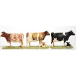 Border Fine Arts 'Shorthorn Cow', model No. 161 by Ray Ayres; together with 'Friesian Cow and