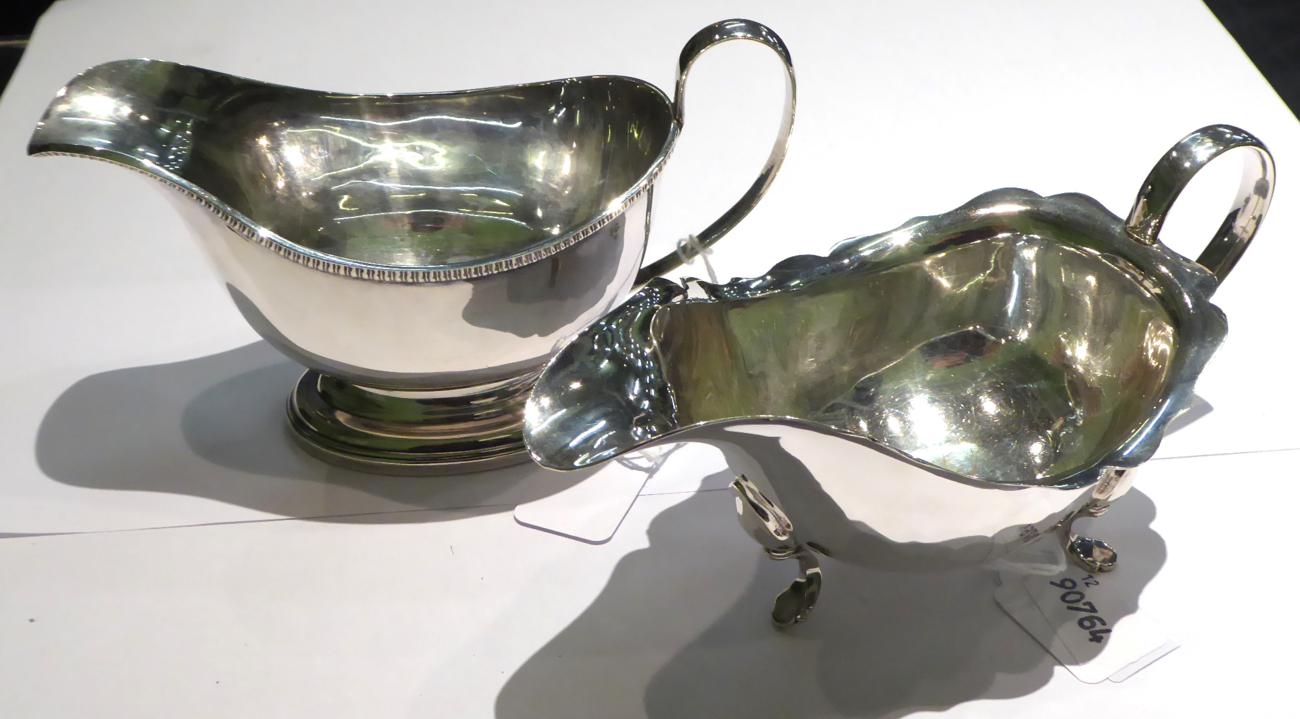 A Georgian style silver sauceboat, London, 1928 with a plated example and a set of plated fish - Image 2 of 3