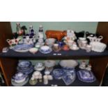 A group of 19th century and later blue and white transfer printed ceramics, various cups and