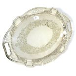 An oval twin-handled electroplated tray with pierced border