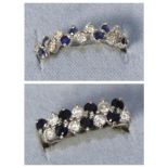 An 18 carat white gold diamond and sapphire half hoop ring, alternating stones; together with