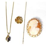 A diamond set pansy pendant on chain, a 9 carat gold sapphire and diamond pendant on chain and a 9