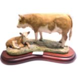 Border Fine Arts 'Simmental Cow and Calf', model No. L21 by Anne Wall, limited edition 223/850, on