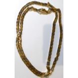 An 18 carat two colour gold fancy anchor chain necklace, length 65cm Hallmarked with sponsor's