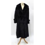 Full length dark brown mink coat, with cuff and rear waist detail 36'' bust, 42'' shoulder to hem,