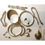 Four silver bangles, three silver bracelets, a silver locket on chain, a pair of silver peridot