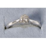 An 18 carat white gold solitaire diamond ring, estimated diamond weight 0.40 carat approximately,