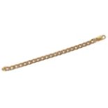 A 9 carat yellow gold curb link bracelet, stamped '375'21cm long, 32.02g gross.