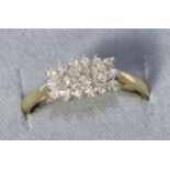 An 18 carat gold princess cut diamond cluster ring, total estimated diamond weight 0.60 carat