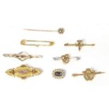 A diamond and seed pearl cluster stick pin (cased), three seed pearl set brooches, an old cut