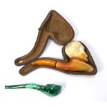 A cased Meerschaum style pipe, Lord Kitchener (a.f.); together with a malachite pipe (2)