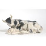 A large Royal Copenhagen model of a cow and calf