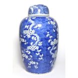 A Chinese Porcelain Jar and Cover, circa 1900, of ovoid form, painted in underglaze blue with the
