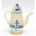 A Creamware Coffee Pot and Cover, circa 1780, of baluster form, painted in underglaze blue with