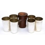 A Set of Six Silver Plated Beakers, Walker & Hall, in a leather travelling case