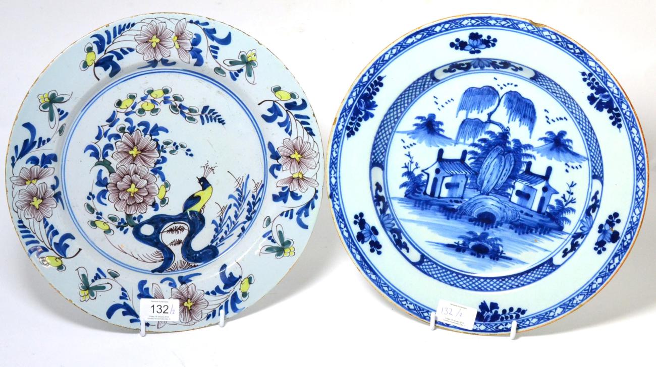 An English Delft Circular Dish, circa 1750, painted in colours with a peacock perched amongst