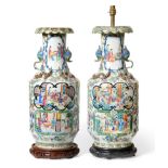 A Pair of Cantonese Porcelain Rouleau Vases, 19th century, the trumpet necks applied with beast