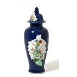 A Chinese Porcelain Baluster Vase and Cover, Qing Dynasty, painted in famille verte enamels with