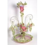 A Pink and Green Vaseline Glass Epergne, with fluted frilled rims, the central trumpet vase