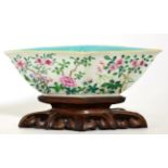 A Chinese Porcelain Bowl, 19th century, of lobed triangular form, painted in famille rose enamels