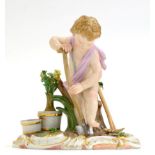 A Meissen Porcelain Figure of a Cherub Gardener, circa 1900, with a spade and rake, plant pots at