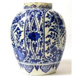 A Delft Fluted Jar, early 18th century, painted in blue with panels of stylised foliage on a foliate