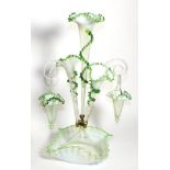 A Green Vaseline Glass Epergne, with frilled rims, the central trumpet vase flanked by two further