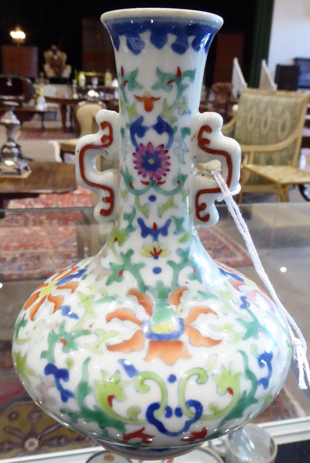 A Chinese Porcelain Bottle Vase, painted in Doucai with scrolling lotus, bears six character - Image 8 of 11