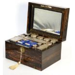 A Victorian Coromandel Travelling Dressing Case, enclosing various glass bottles and boxes with