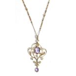 An Art Nouveau Amethyst, Seed Pearl and White Stone Necklace, an oval cut amethyst in a milgrain
