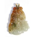 A Jade Pendant, carved with fruiting vines, of brown green tone, to a 9 carat gold bail, measures