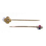 A Diamond, Sapphire and Ruby Clover Stick Pin, estimated diamond weight 0.15 carat approximately and