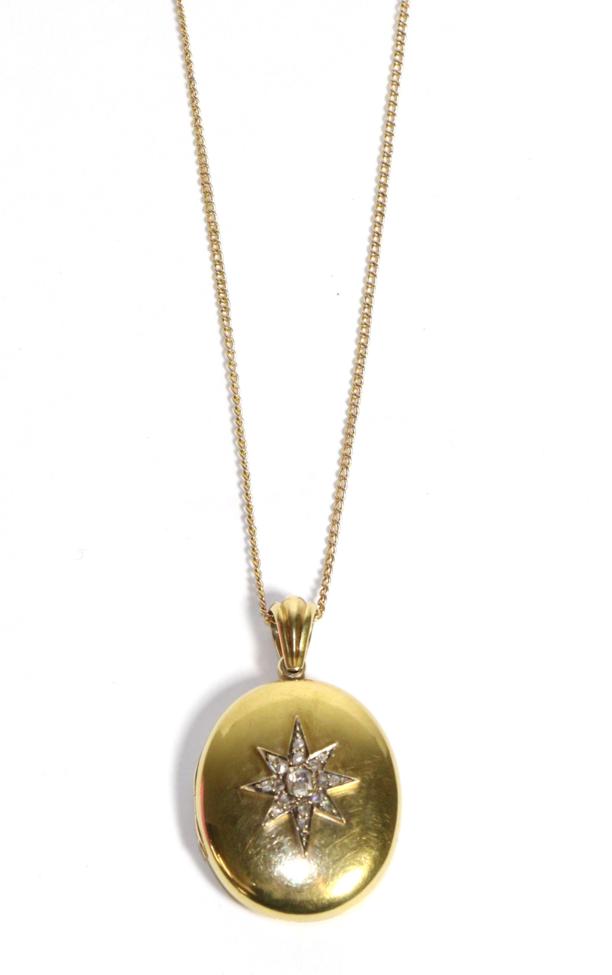 A Diamond Locket on Chain, an oval locket with a central cluster of rose cut and old cut diamonds in