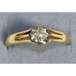 An 18 Carat Gold Solitaire Diamond Ring, an old cut diamond in an extended claw setting, to a