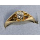 An 18 Carat Gold Solitaire Diamond Ring, an old cut diamond in a claw setting, to a tapering