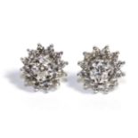 A Pair of Diamond Cluster Earrings, a round brilliant cut diamond in an illusion setting within a