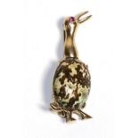 A Jasper and Ruby Bird Brooch, modelled as an abstract bird with a jasper body and a ruby set eye,